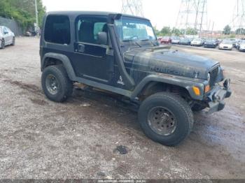  Salvage Jeep Wrangler