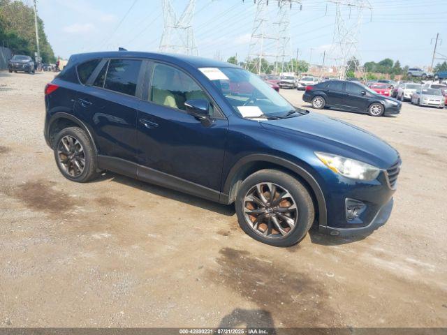  Salvage Mazda Cx