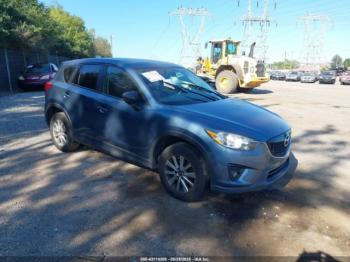  Salvage Mazda Cx