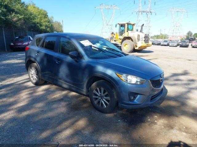  Salvage Mazda Cx